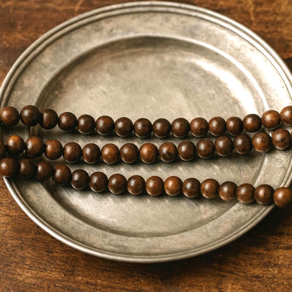 Naturholzperlen Strang rund braun 6 - 6,5 mm (ca. 63 Perlen / ca. 38 cm Länge)