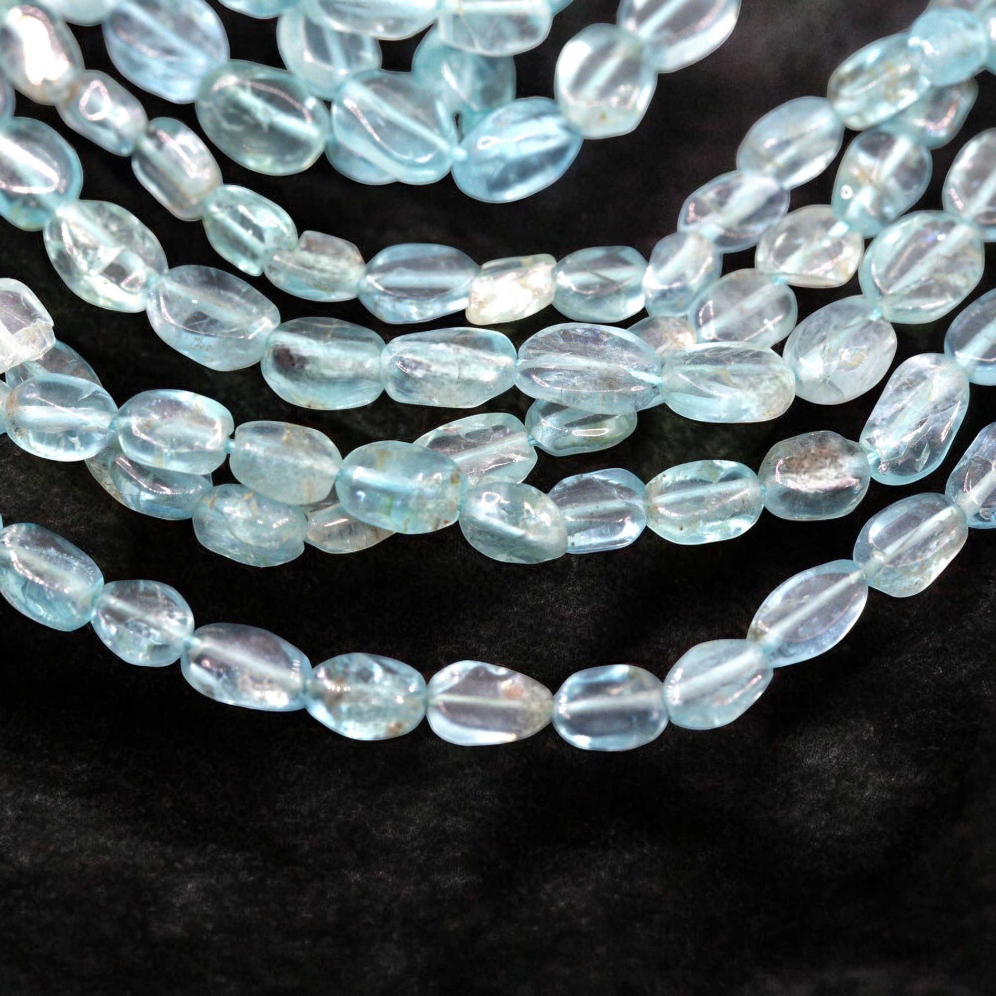 Blauer Topaz Perlenstrang unregelmäßige ovale Perlen 6-6,5 x 3-3,5 x 2,5 mm (ca. 36 cm Länge)