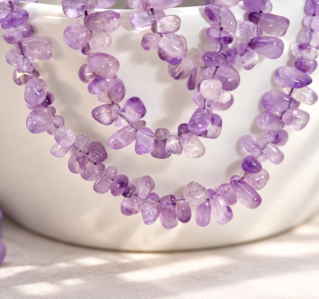 Amethyst unregelmäßige Nugget Perlen quergebohrt 6,5 - 7,5 x 3 - 6 mm (ca. 31 cm Länge)