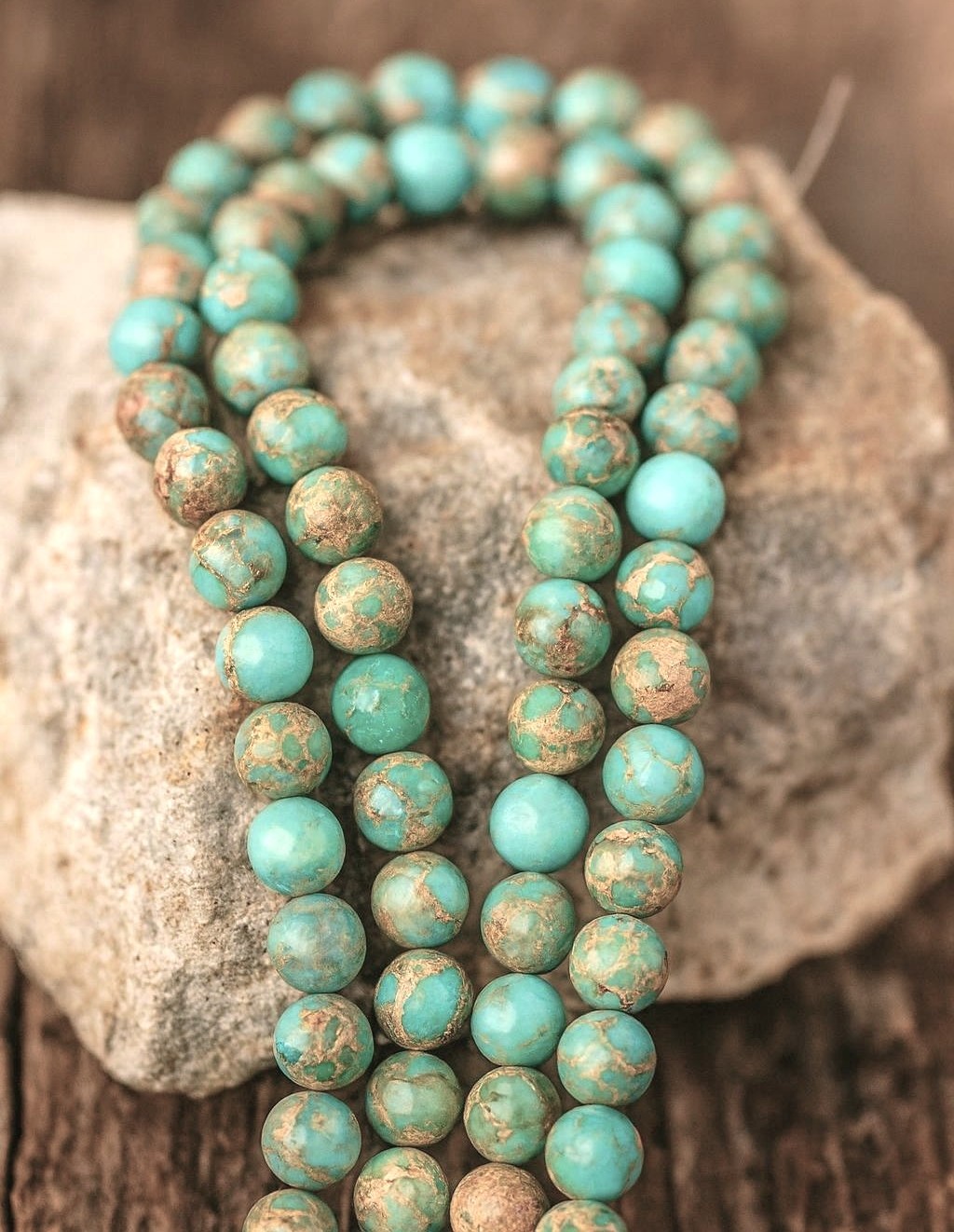 Natürlicher Regalit Kaiser Jaspis rund glatt 6,6 mm (ca. 61 Perlen / ca. 38,5 cm Länge)