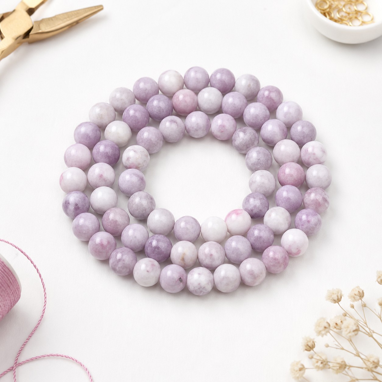 Turmalin Perlenstrang 6 - 6,3 mm rund glatt glänzend (ca. 64 Perlen / ca. 38 cm Länge) - Edelsteinperlen in zarten Rosa- und Lilatönen