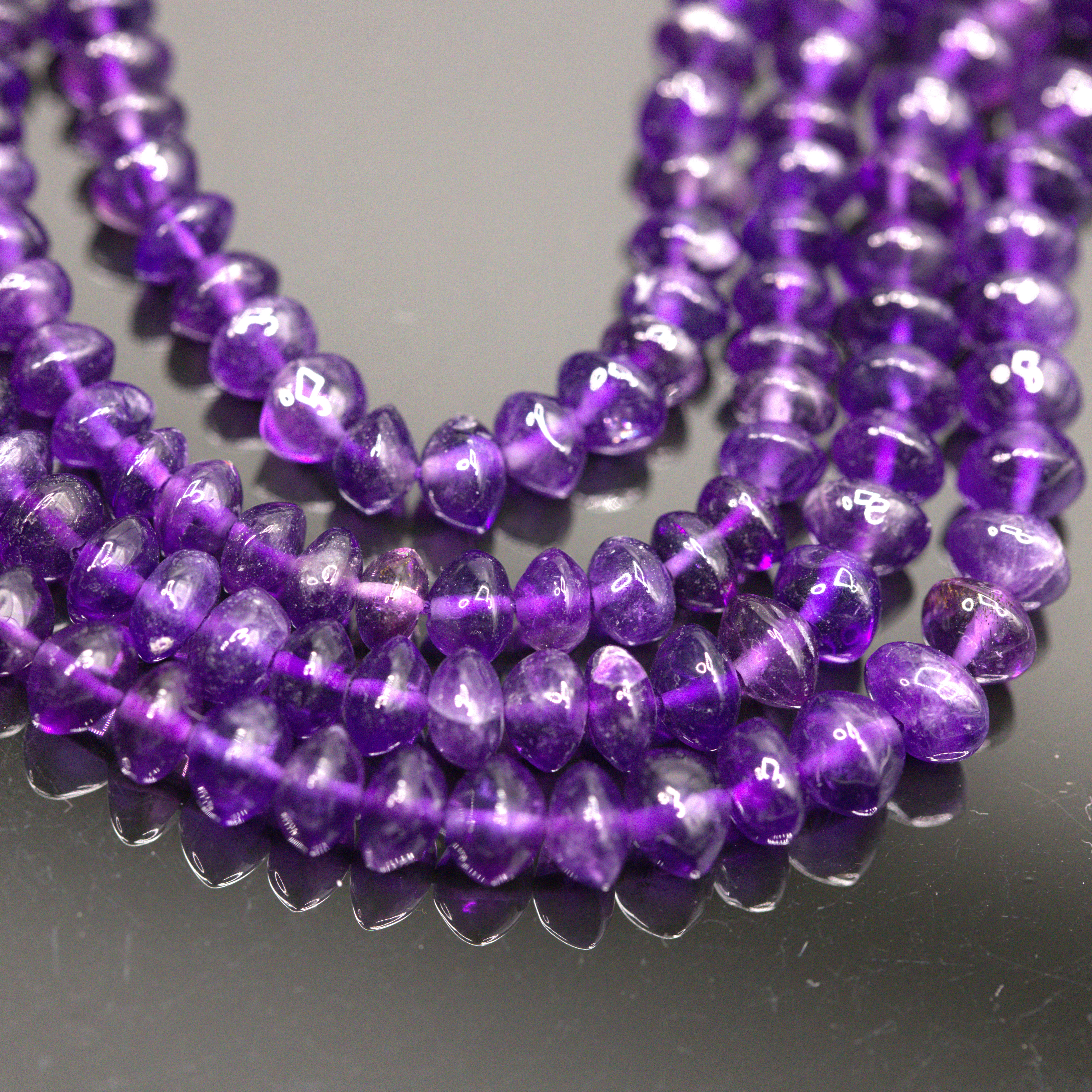 Amethyst Perlenstrang unregelmäßige Rondelle 4-5 x 2-3 mm (ca. 33 cm Länge)