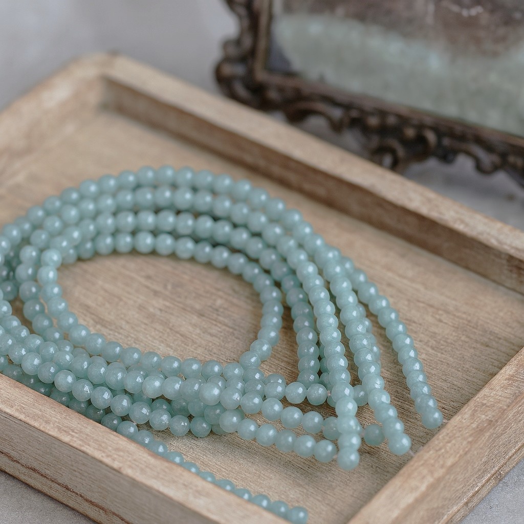 Malaysia Jadeperlenstrang 6 mm gefärbt rund glatt glänzend (ca. 63 Perlen / ca. 38,5 cm Länge)