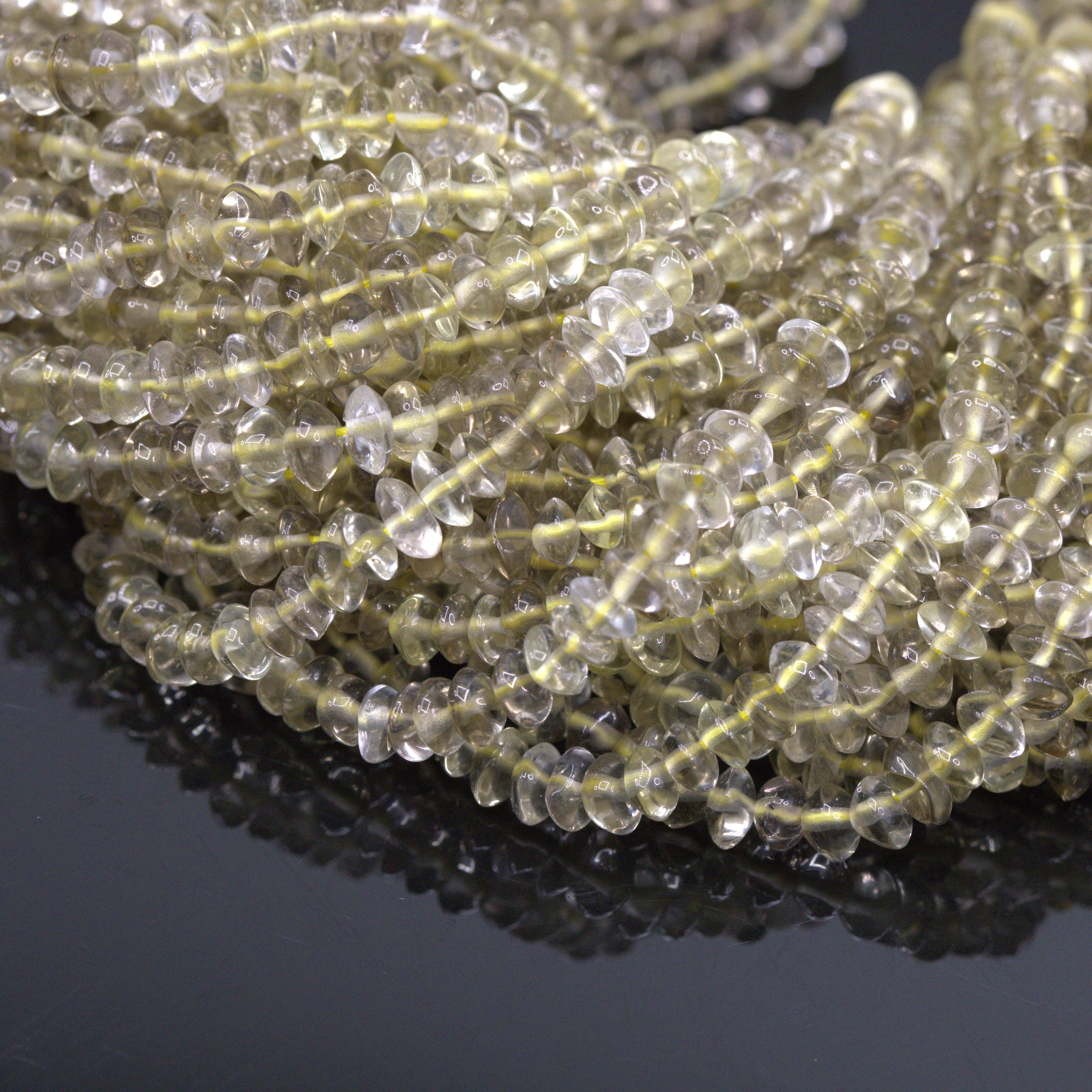Prasiolith Perlenstrang 3 - 5 mm unregelmäßige Rondelle (ca. 35 cm Länge)