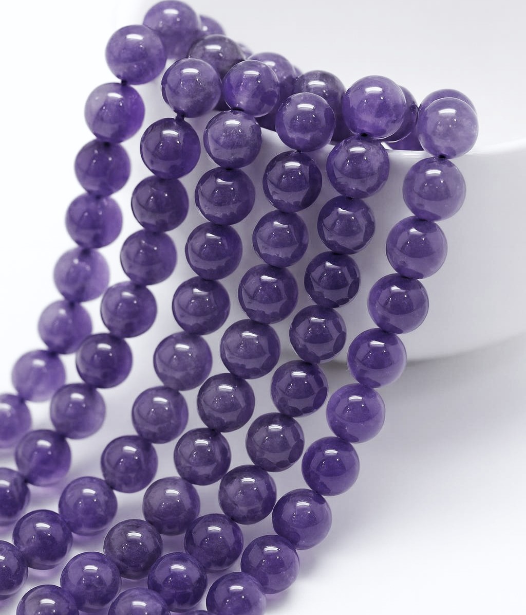 Amtheyst Perlenstrang 6,5 mm (ca. 62 Perlen / ca. 39 cm Länge)