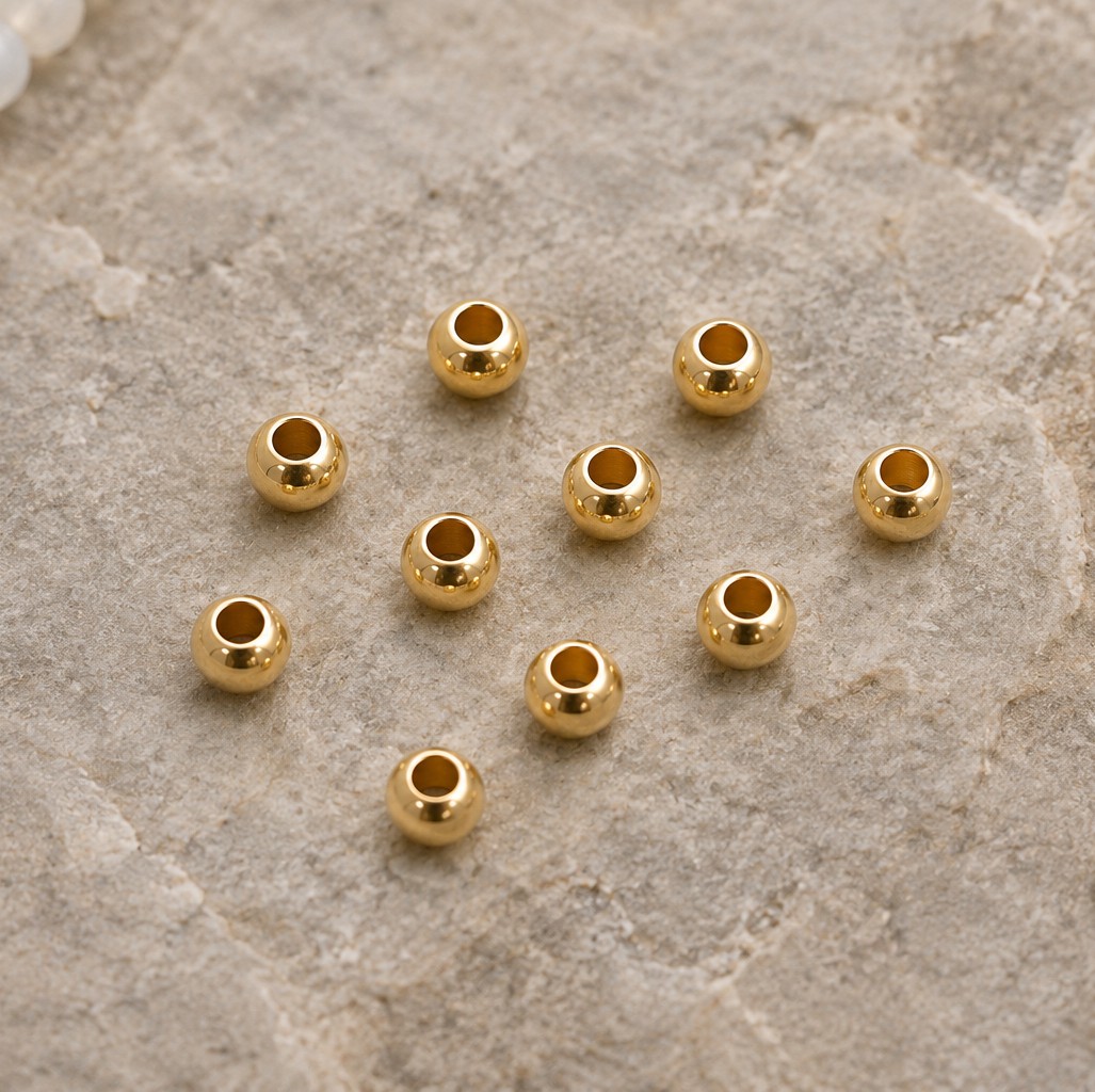 20 Edelstahl Perlen 4 x 3 mm 18k vergoldet Zwischenperlen Spacer Abstandsperlen