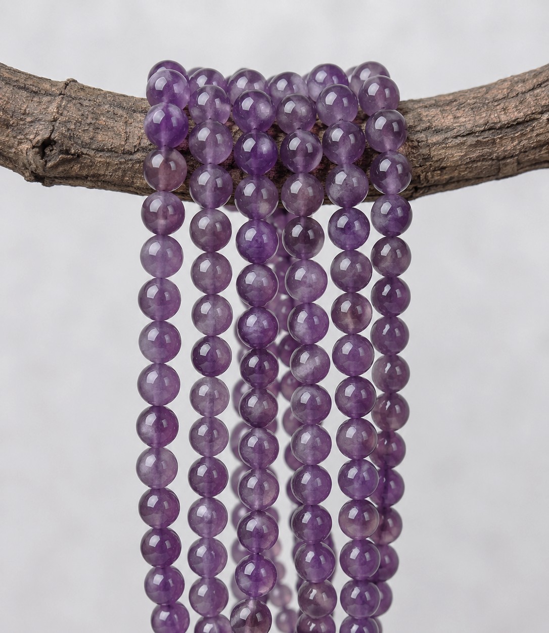 Amethyst Perlenstrang 6 - 6,5 mm Klasse AB rund (ca. 66 Perlen / ca. 38 cm Länge)