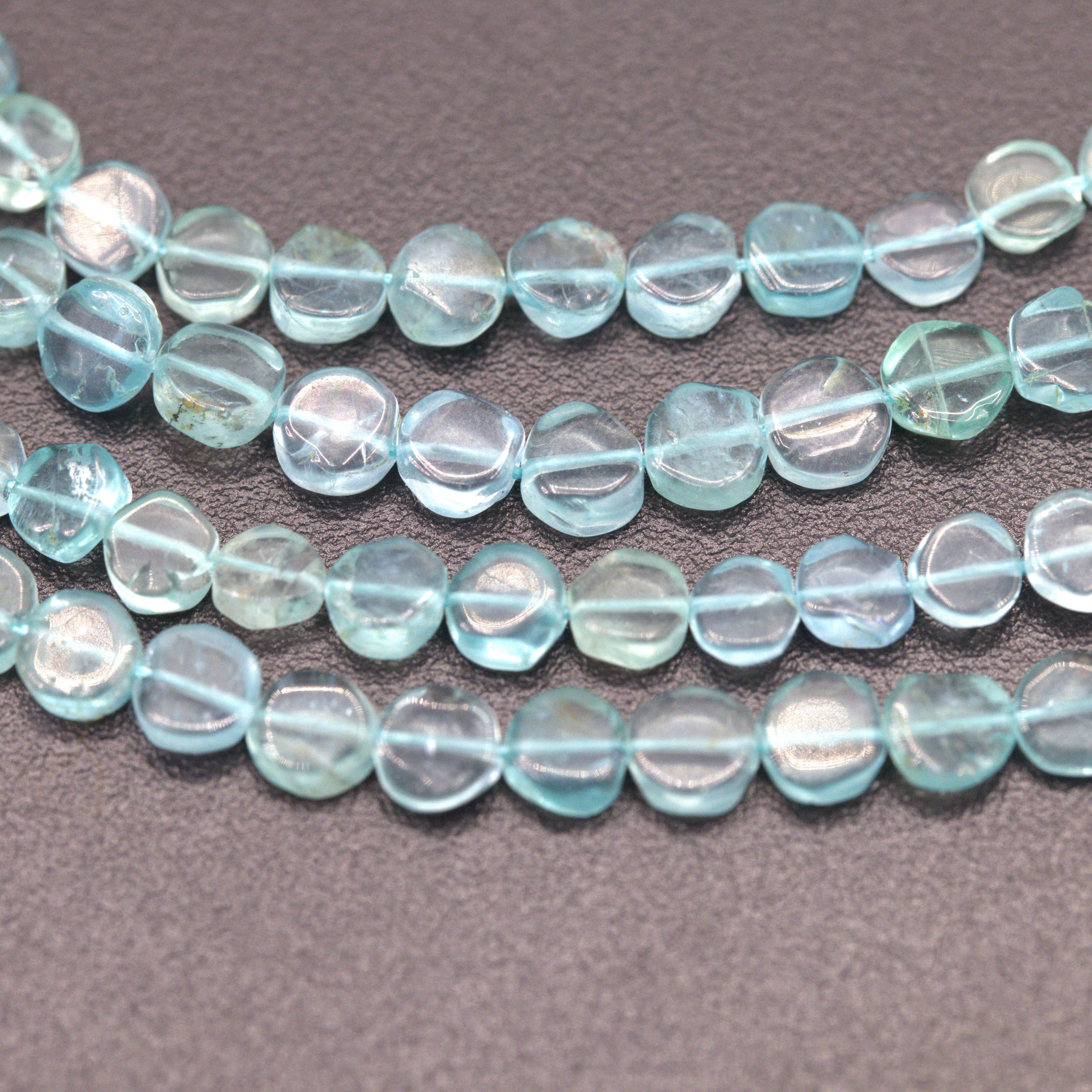 Blauer Topaz Perlenstrang 4,6 x 2,3 mm unregelmäßige runde flache Perlen (ca.34 cm Länge)