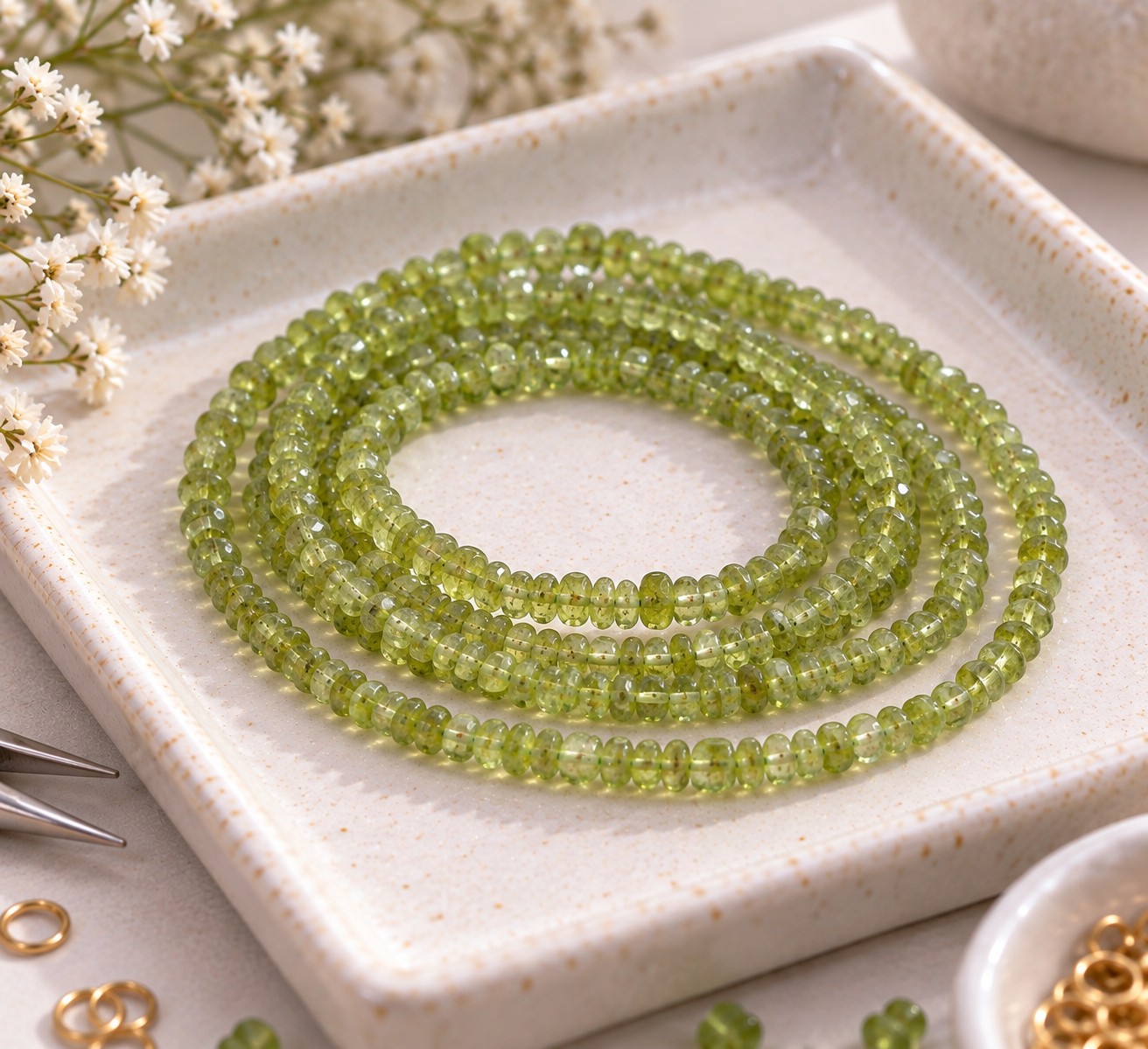 Peridot Edelstein Perlenstrang unregelmäßige Rondelle ca. 3,8 x 2 mm (ca. 33 cm Länge)