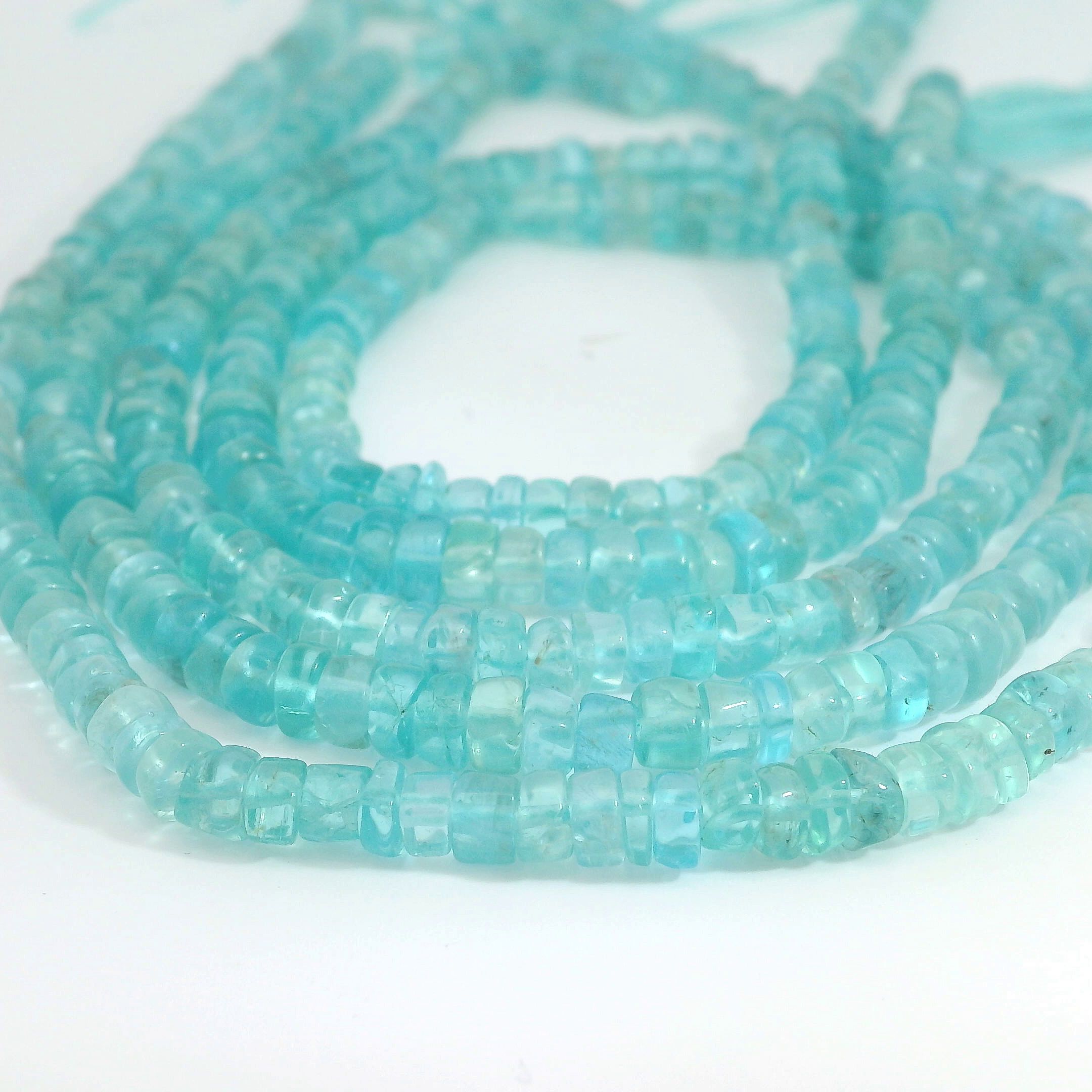 Blauer Topaz Perlenstrang 4,3 - 4,5 x 2 - 3 mm unregelmäßige Rondelle (ca. 35 cm Länge)