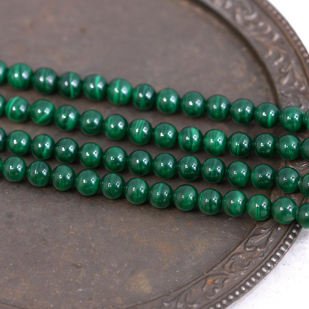 Malachit Perlenstrang 5,8 - 6 mm runde Perlen (ca. 65 Perlen / ca. 40 cm Länge)