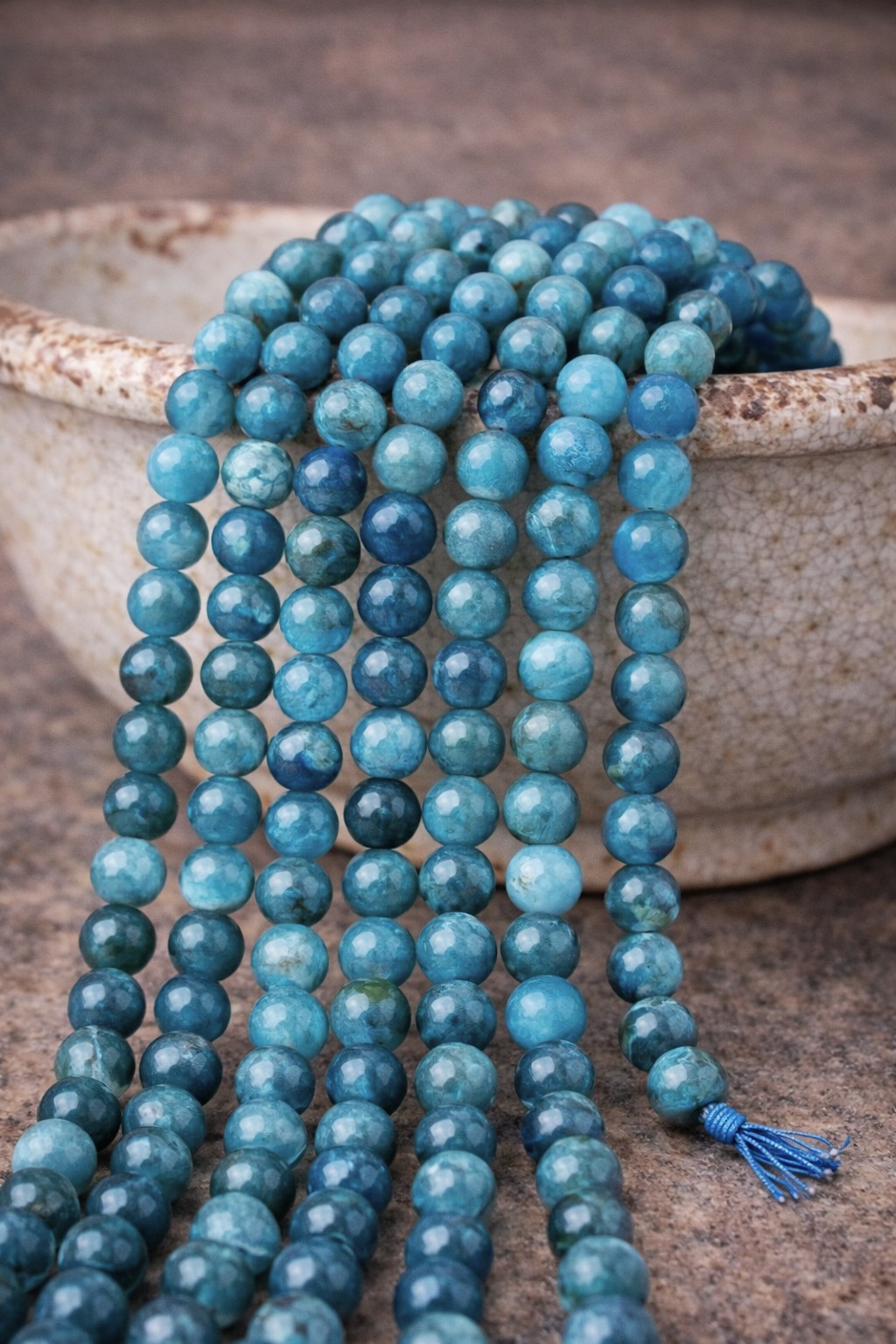 Apatit Perlenstrang 6,3 mm (ca. 64 Perlen / ca. 39 cm Länge)