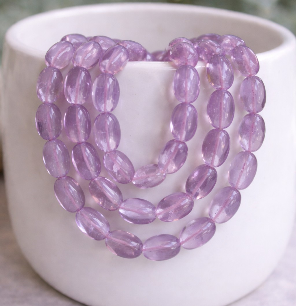 Heller Amethyst Perlenstrang 8 x 6-7 x 4 - 4,5 mm ovale Nuggets (ca. 33 cm Länge)