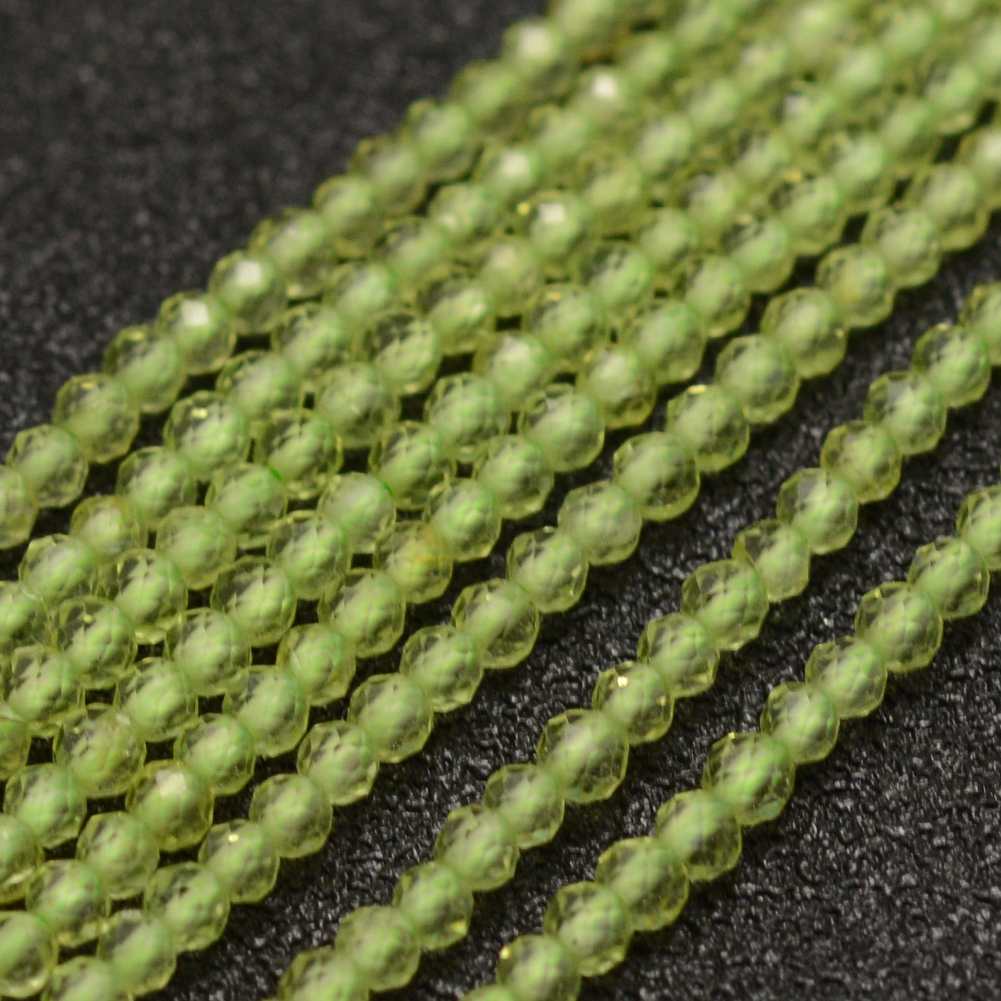 Peridot Perlenstrang facettiert 2,3 - 2,4 mm (ca. 170 Perlen / ca. 39 cm Länge)