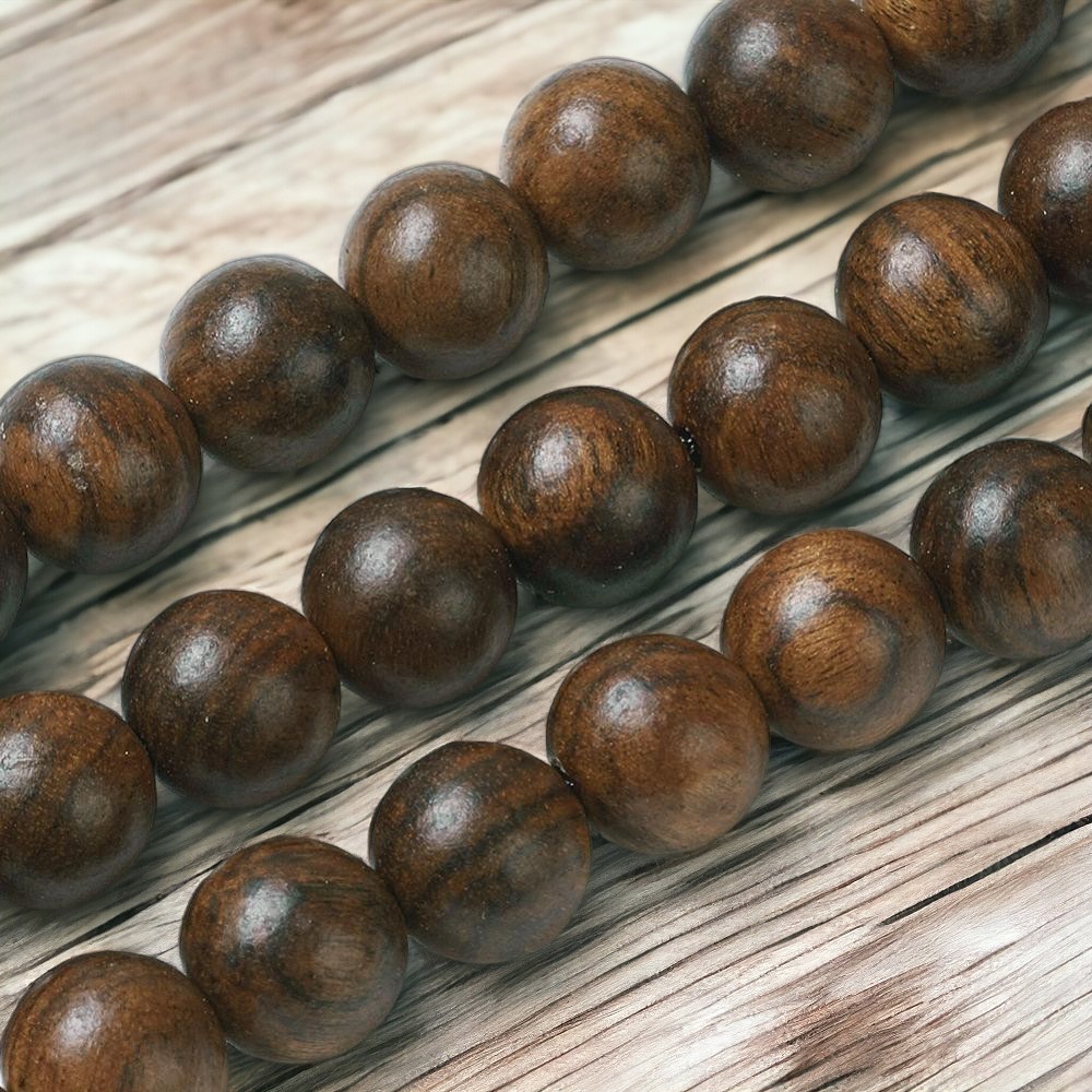 Naturholzperlen Strang rund braun 7,5 - 8 mm (ca. 48 Perlen / ca. 38 cm Länge)