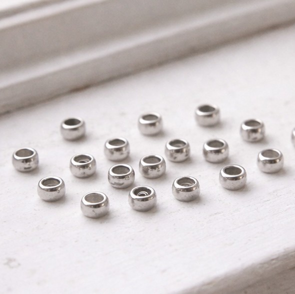 20 Edelstahl Quetschperlen 3 x 2 mm