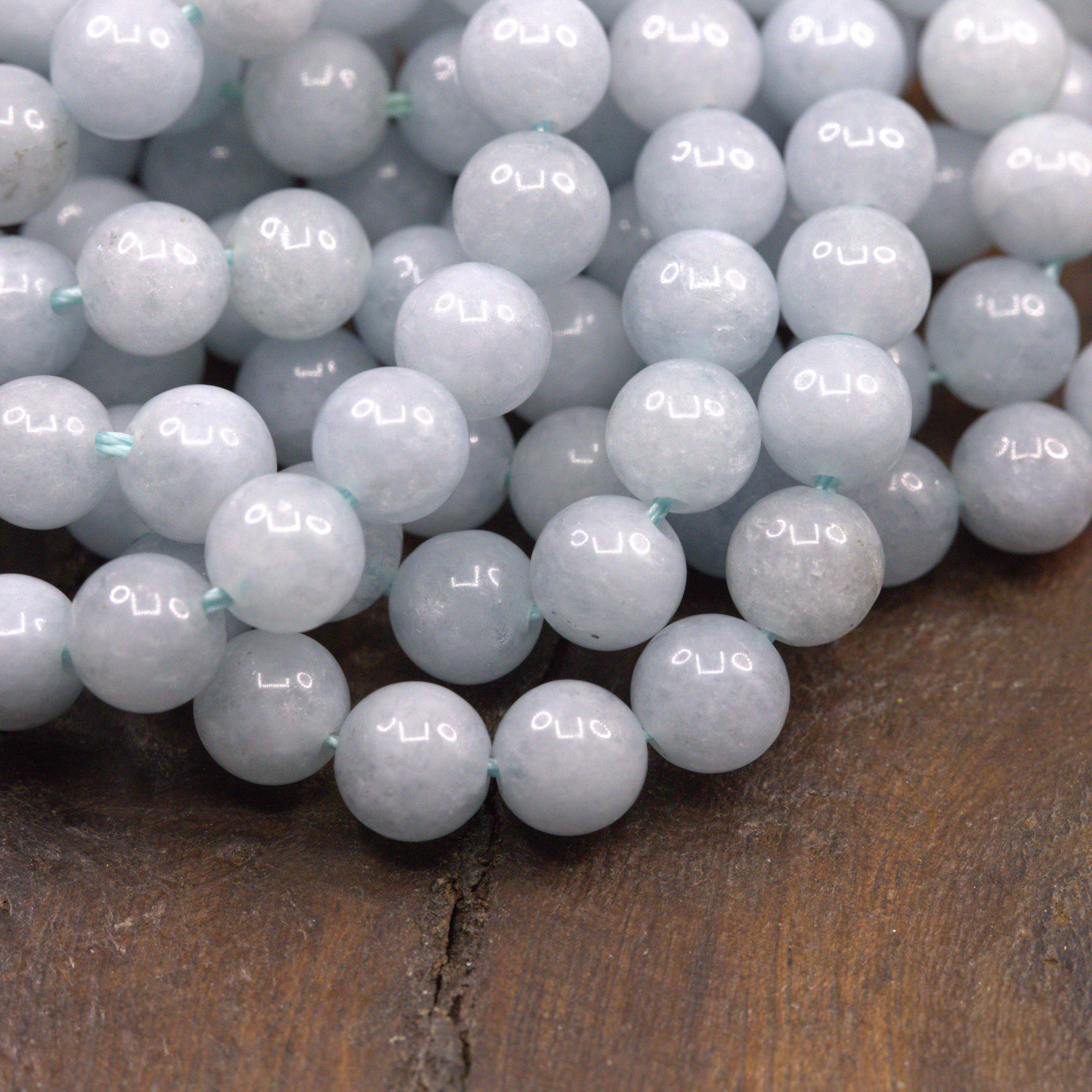 Aquamarin Perlenstrang 6 mm rund glatt (ca. 62 Perlen / ca. 39 cm Länge)