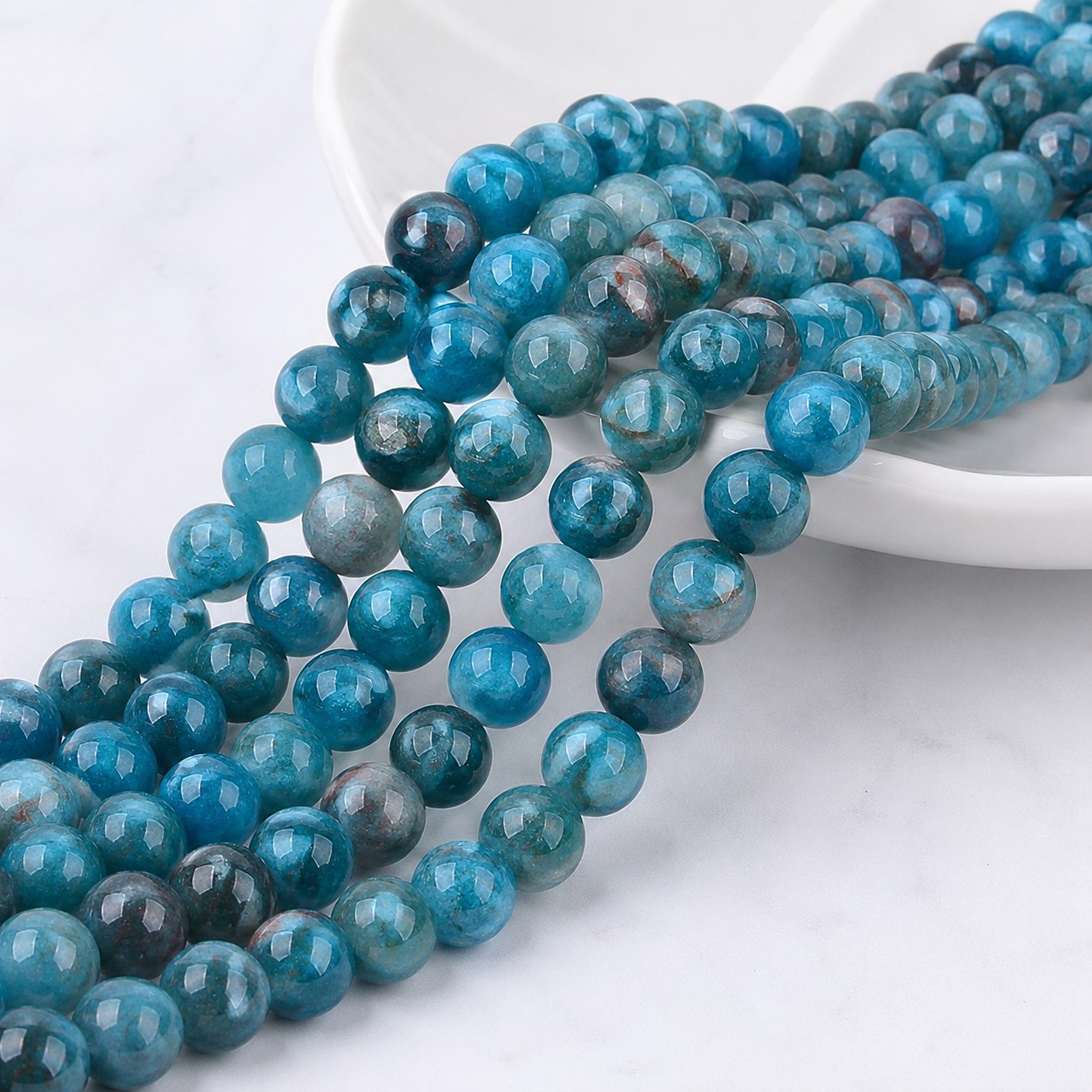 Apatit Perlenstrang 8 mm (ca. 48 Perlen / ca. 38 cm Länge) - natürliche Edelsteinperlen in faszinierenden Blau- und Türkistönen