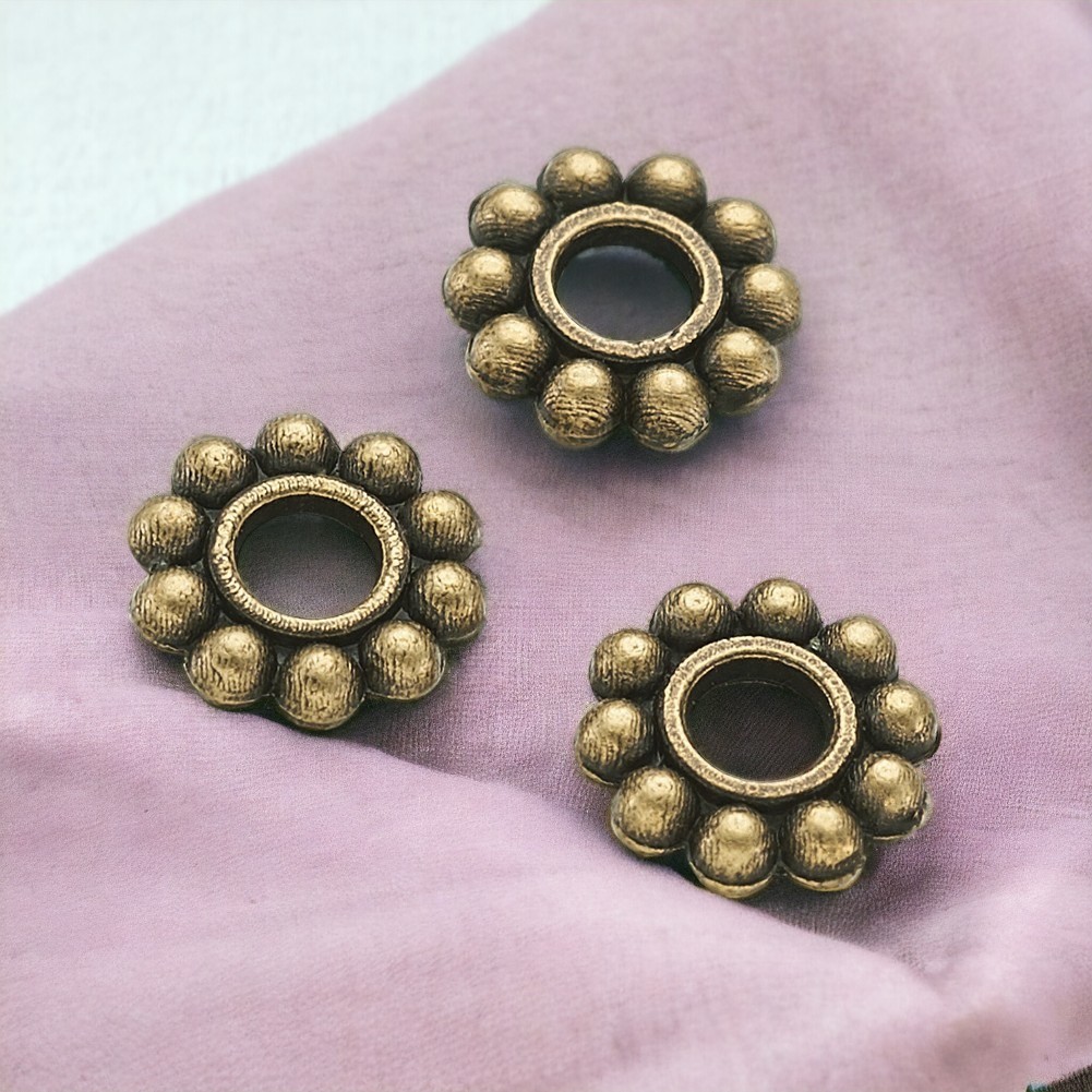 20 Zwischenperlen Spacer Blume antik bronzefarben 6,5 x 1,5 mm