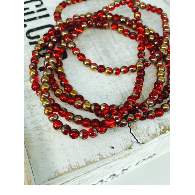 1 Strang tschechische Glasperlen rot goldfarben glänzend (ca. 50 Perlen / ca. 26 cm Länge)