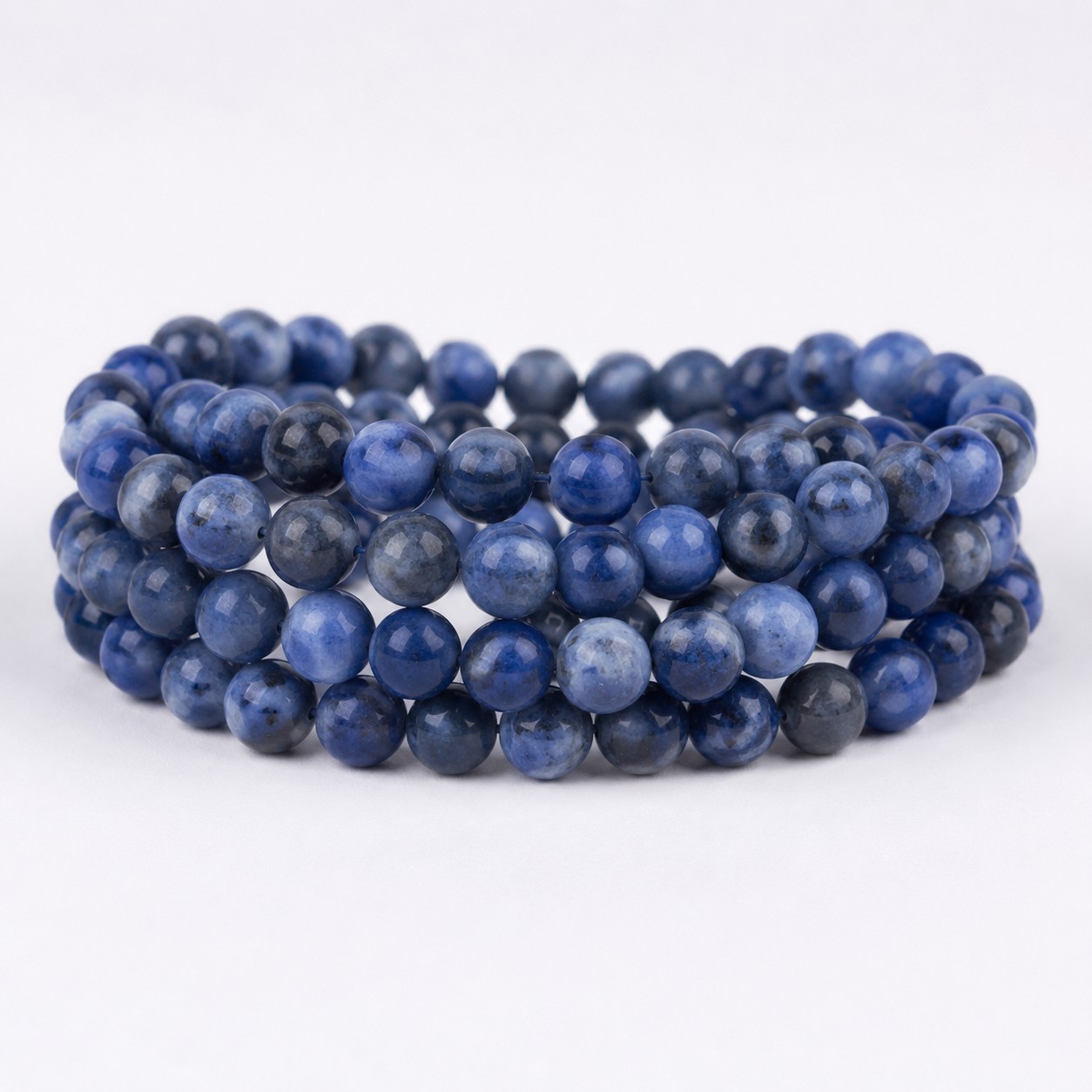 Kurzer Sodalith Perlenstrang mitternachtsblau rund glatt 6,3 - 6,5 mm (ca. 30 Perlen / ca. 19 cm Länge)