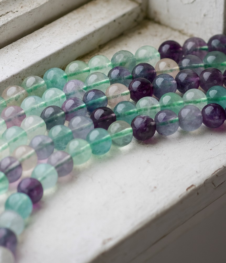Fluorit Perlenstrang 8,6 mm (ca. 46 Perlen / ca. 39 cm Länge)