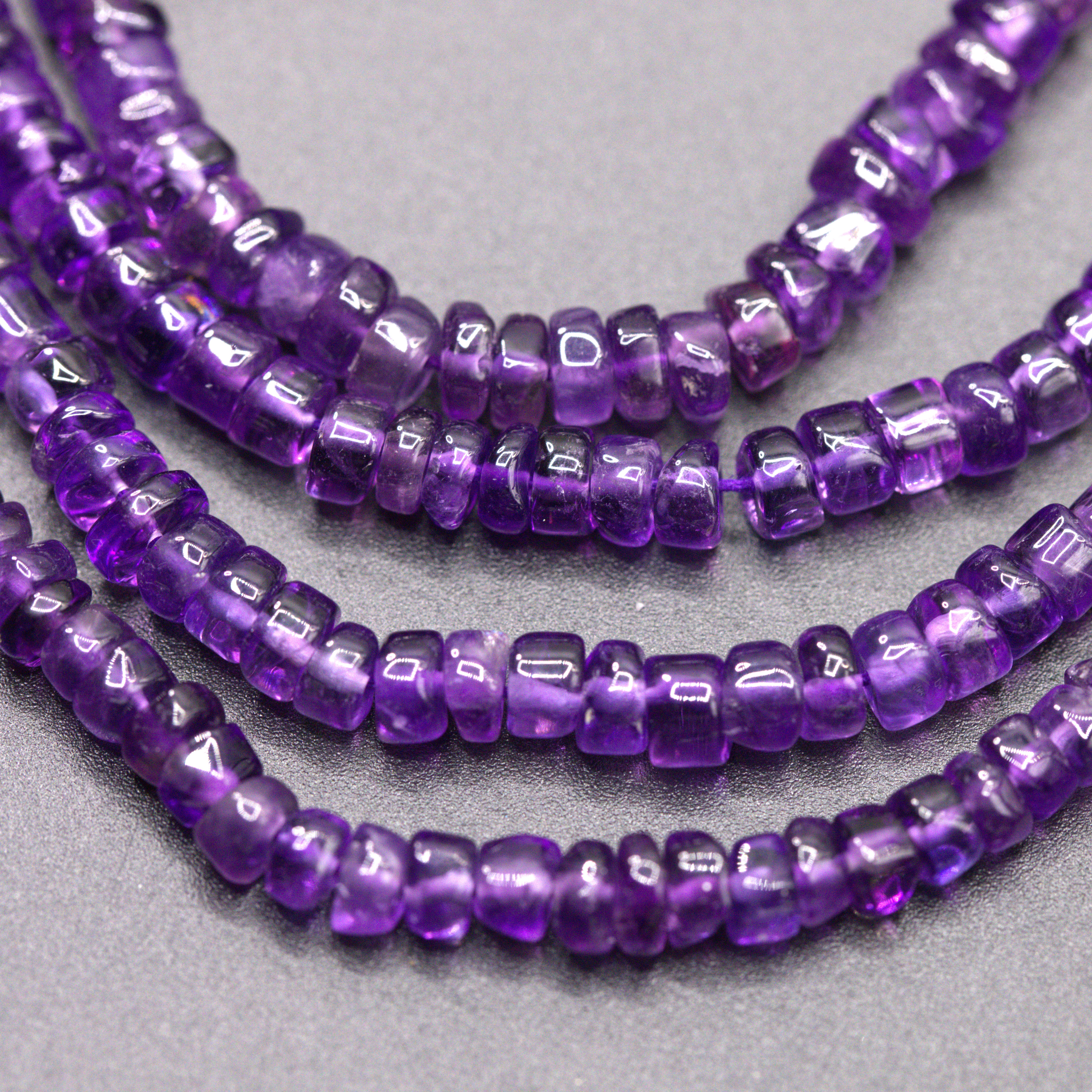 Amethyst Perlenstrang unregelmäßige Rondelle 3-5 x 2-3 mm (ca. 34 cm Länge)