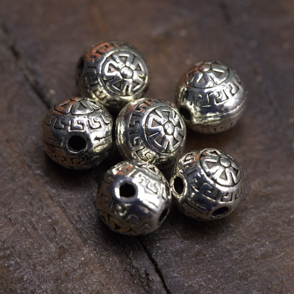 Eine 3-Loch Guru Perle aus Metall im tibetischen Stil rund antik silberfarben 9 x 9,5 mm