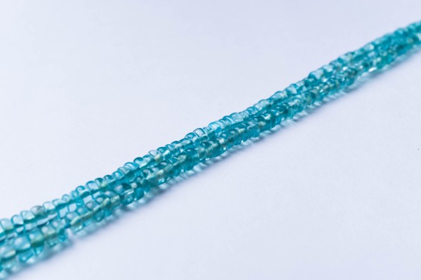 Apatit Perlenstrang unregelmäßige Rondelle 3-4 x 2-3 (ca. 34 cm Länge)