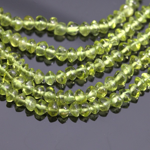 Peridot Perlenstrang unregelmäßige Rondelle 3 - 5 mm (ca. 33 cm Länge)